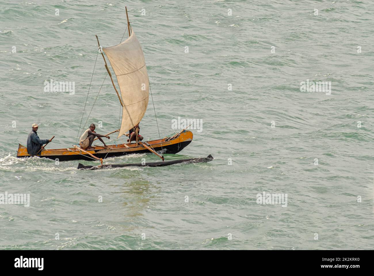 Mauritius fishermen in their dugout canoe Stock Photo