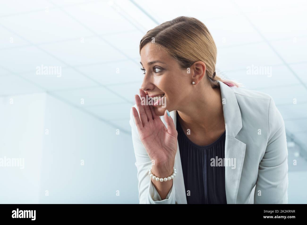 office worker revealing secrets Stock Photo