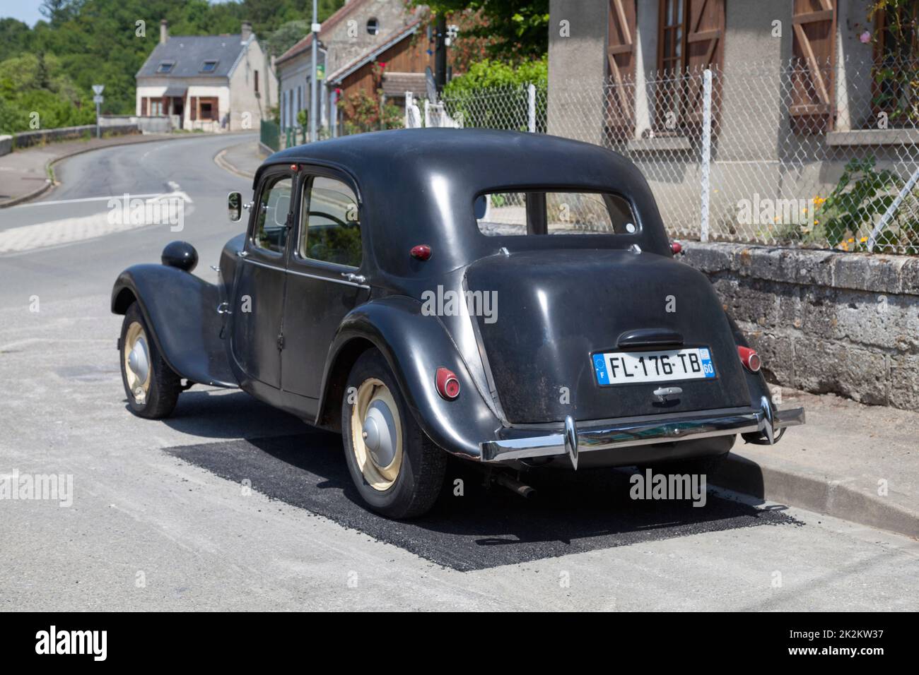 Pierrefonds, France - May 27 2020: Black Citroën Traction Avant 11BL parked in a street. Stock Photo
