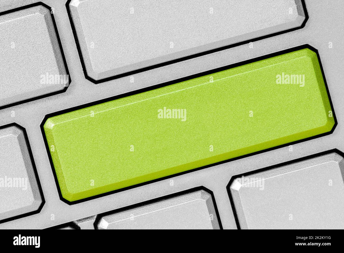 Green blank enter key on keyboard background Stock Photo