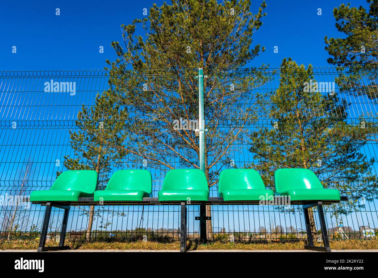 Plastic chairs in the basketball court from a low angle Stock Photo