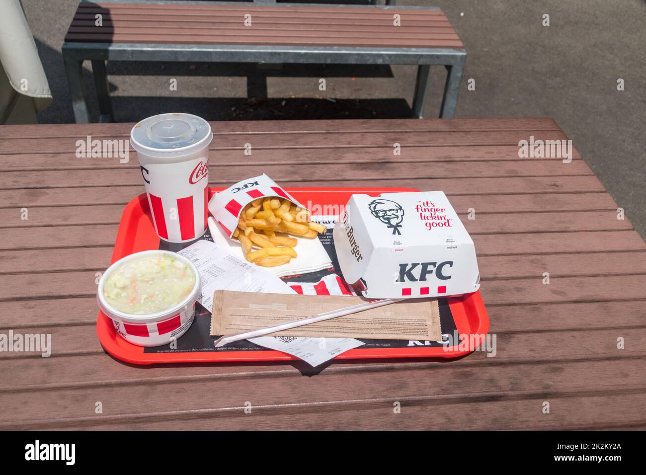 Oradea, Romania - June 11, 2022: KFC menu with Fillet Mozzarella burger. Stock Photo
