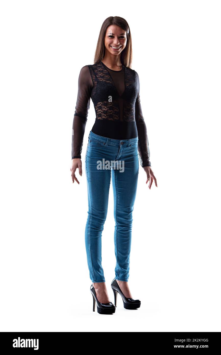 Trendy slender young woman with a vivacious smile Stock Photo Alamy