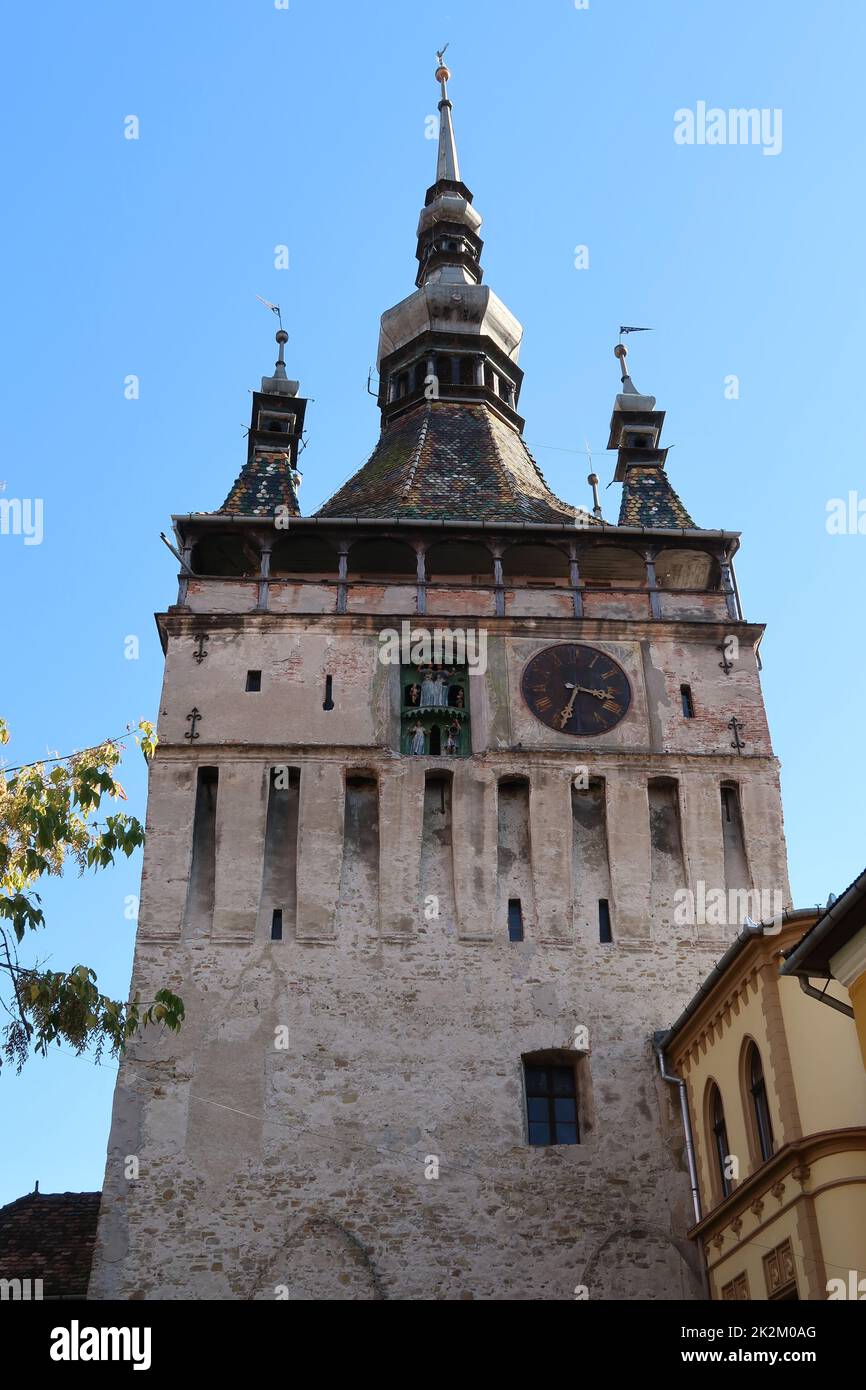 View onto Sighisoaras famous Clock Tower from inside of the citadel Stock Photo