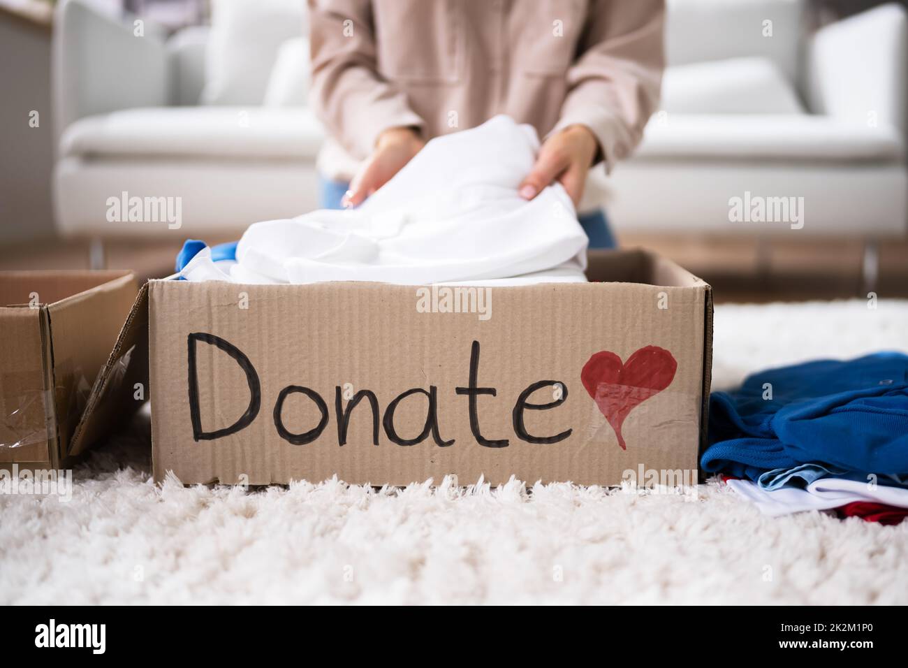 Donating Decluttering And Cleaning Up Wardrobe Stock Photo