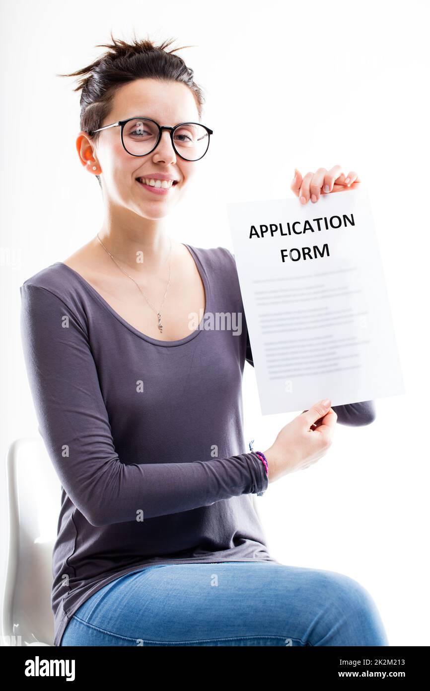 woman-showing-an-application-form-stock-photo-alamy