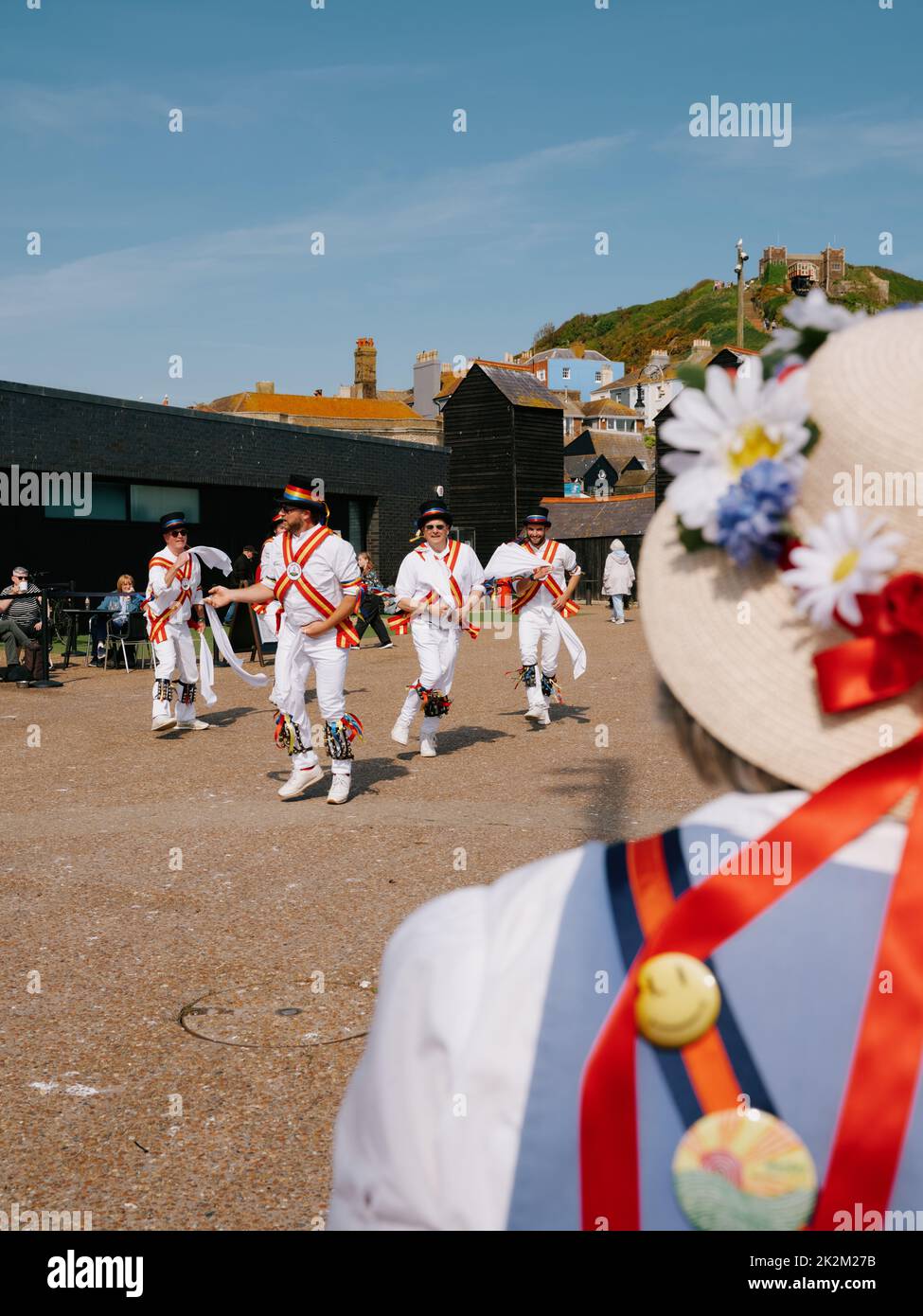 Morris dancers dancing on The Stade open space at the Jack in the Green festival May 2022 - Hastings East Sussex England UK Stock Photo