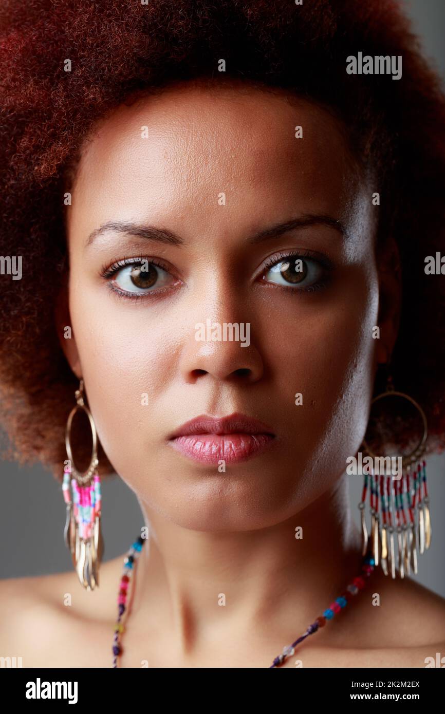 Solemn earnest young Black woman staring at the camera Stock Photo Alamy