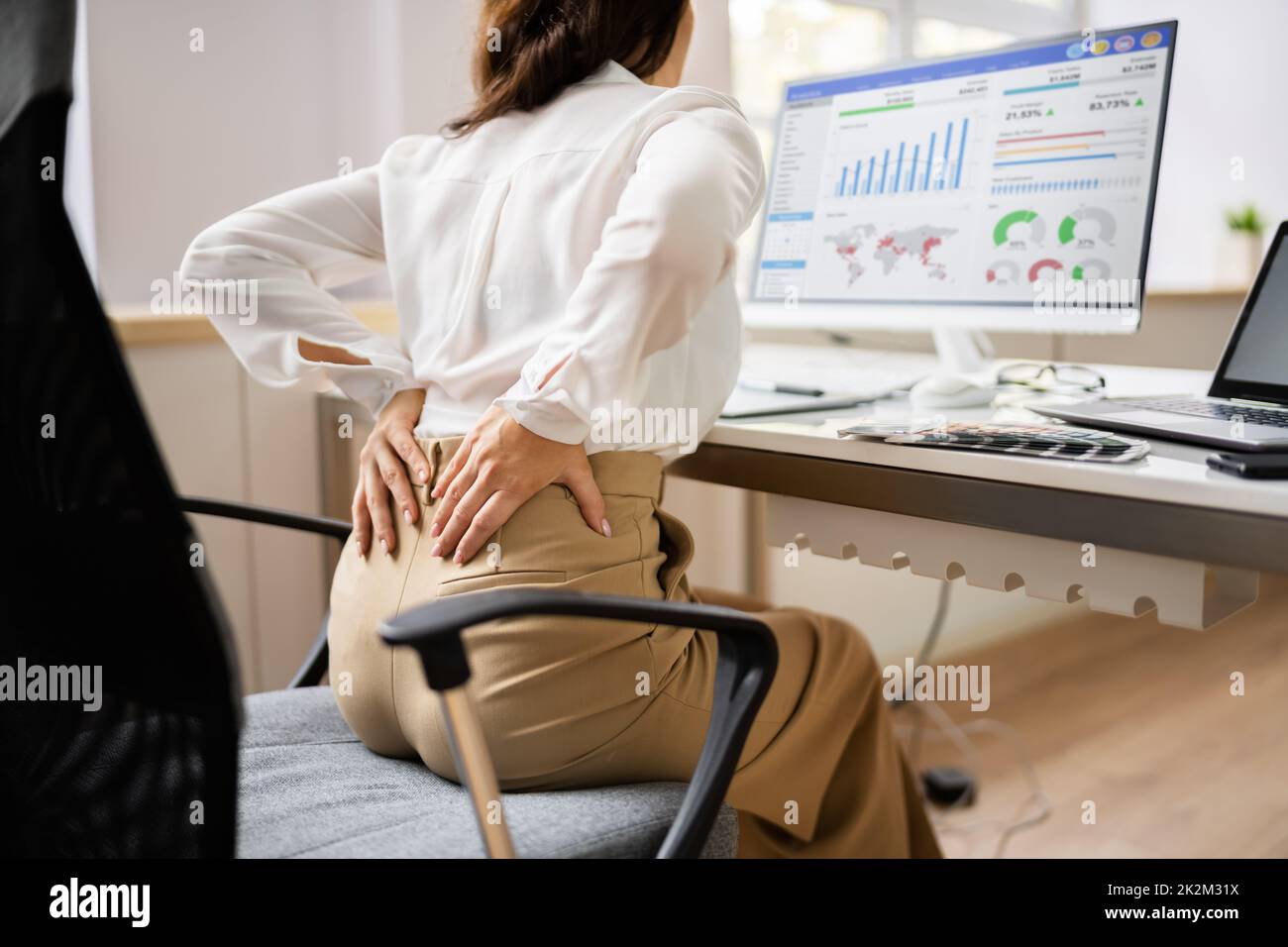 Back Pain Bad Posture Woman Sitting Stock Photo Alamy
