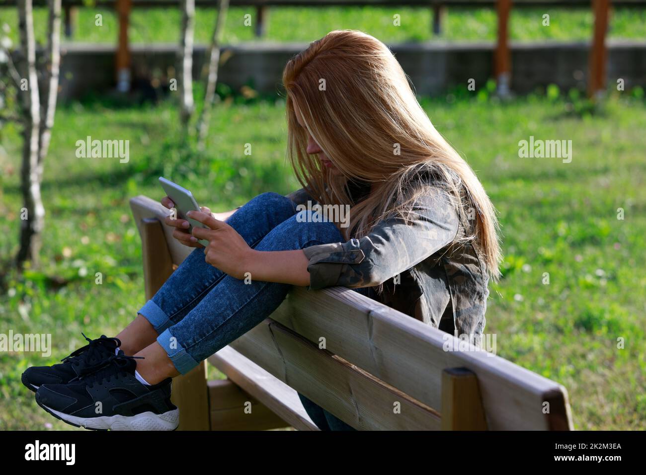 Young woman with lovely long straight blond hair Stock Photo Alamy
