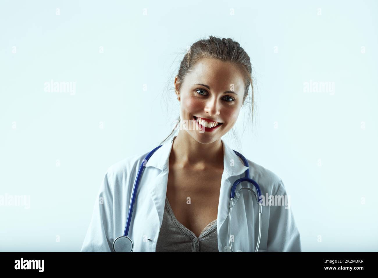 Attractive young doctor portrait in hi-res stock photography and images ...