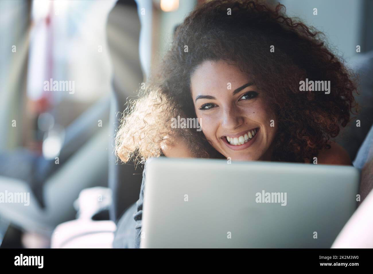 Vivacious young woman with a warm happy smile Stock Photo - Alamy