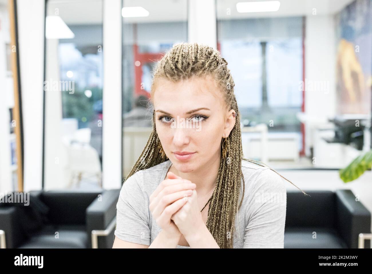 candid portrait of woman at work Stock Photo