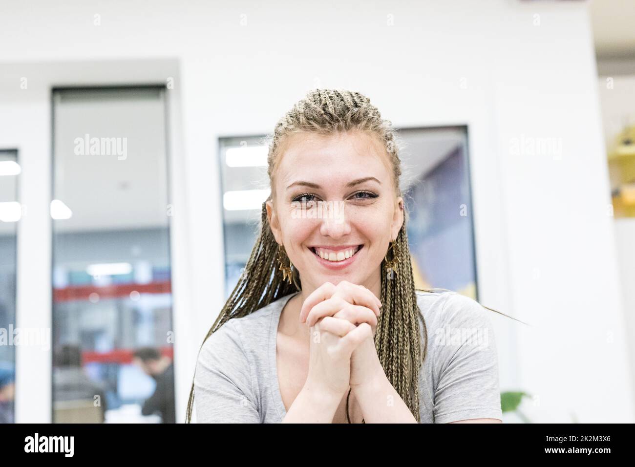 candid portrait of woman at work Stock Photo