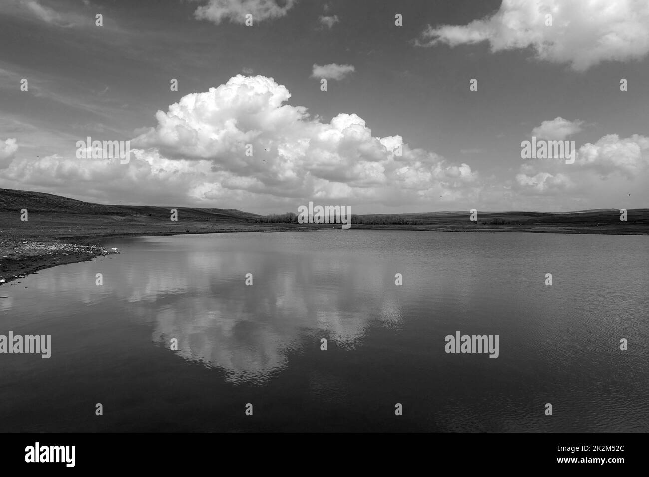 wonderful spring landscape of sky lake and clouds,clouds reflecting in water Stock Photo