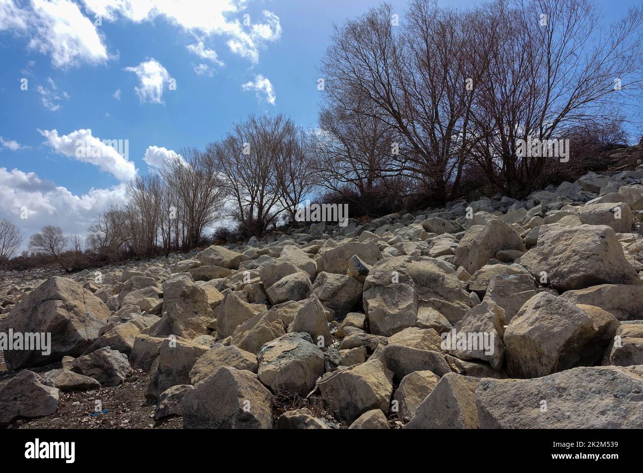 large boulders placed in front of the ponds, large rocks that act as ...