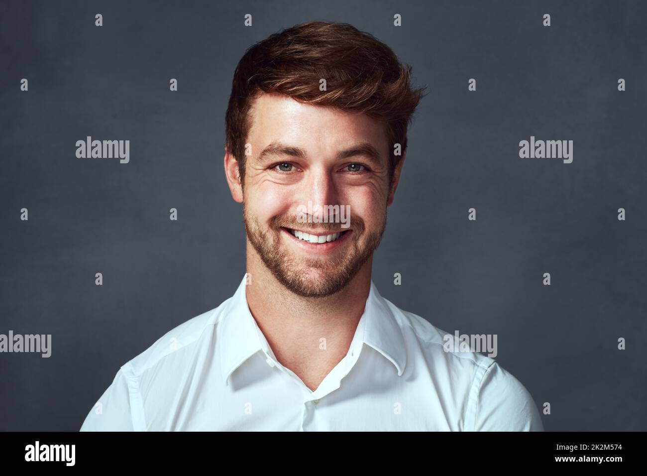 Keeping it real inspires confidence. Studio portrait of a handsome young man posing against a