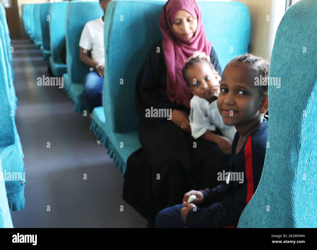 Djibouti City. 19th Sep, 2022. Passengers sit on a train at the Nagad railway station along the Ethiopia-Djibouti railway in Djibouti, Sept. 19, 2022. The Chinese-built 752.7-km-long Ethiopia-Djibouti standard gauge railway, also known as the Addis Ababa-Djibouti railway, is the first fully electrified trans-boundary railway on the African continent. The Ethiopia-Djibouti railway company has reported increasing revenue during its four years of operation while driving economic growth and industrialization along the route. Credit: Dong Jianghui/Xinhua/Alamy Live News Stock Photo