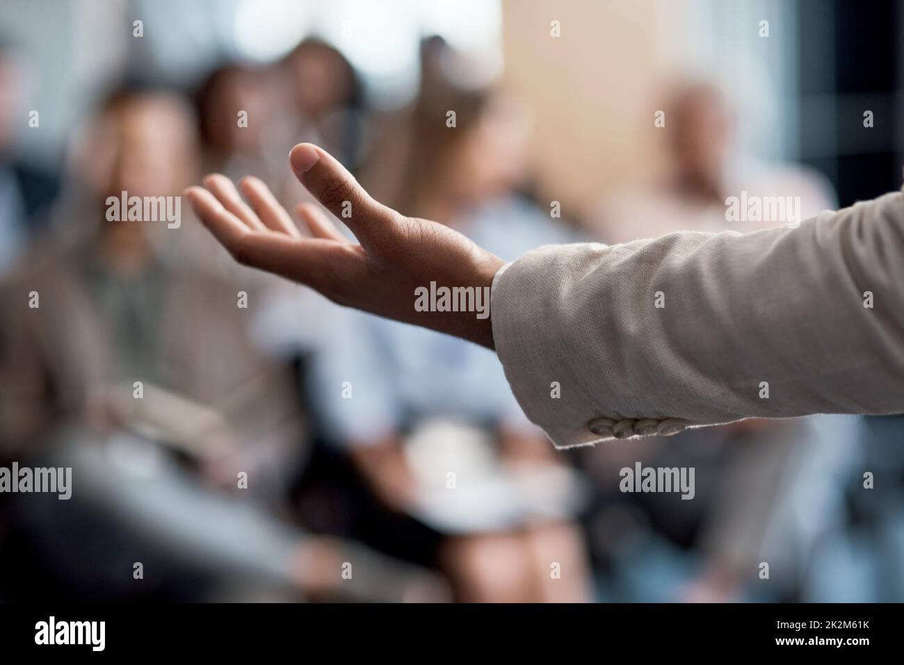 Any questions. Shot of an unrecognizable businessman delivering a ...