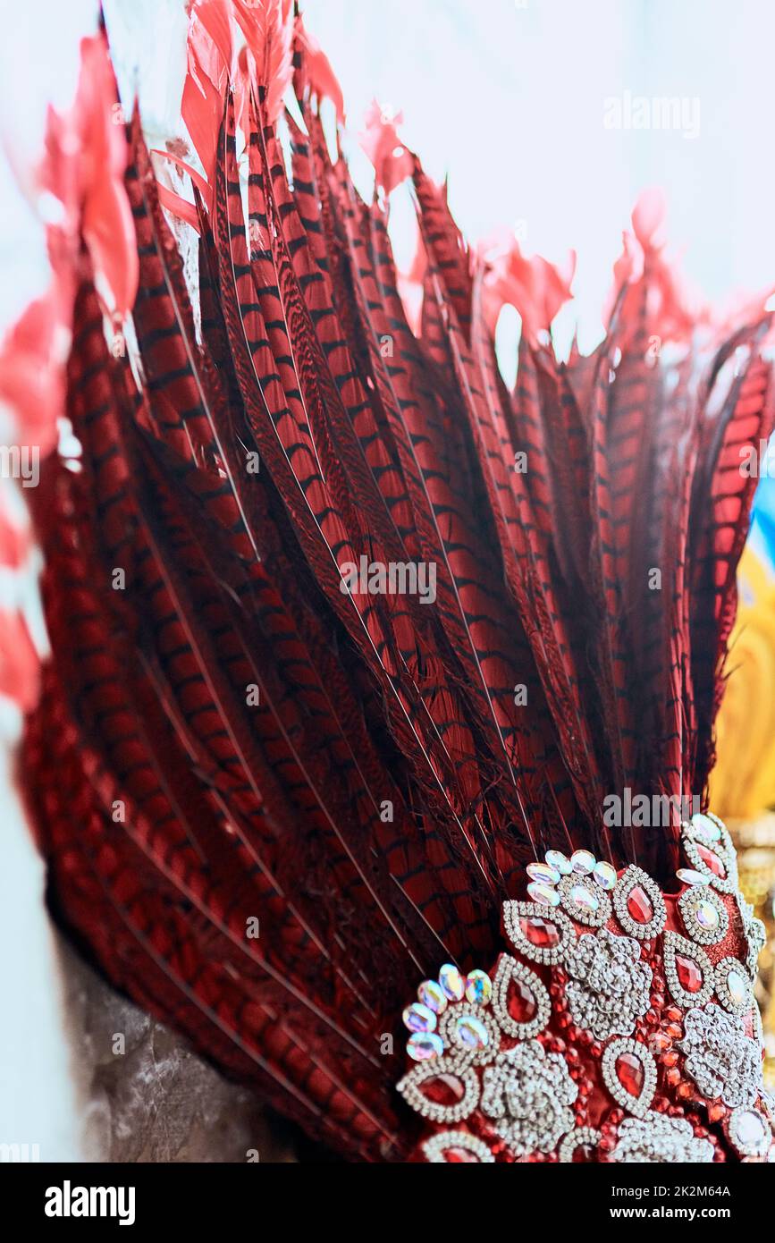 The longer the feather the closer to heaven. Closeup shot of a costumes headwear of samba dancers for carnival with no people. Stock Photo