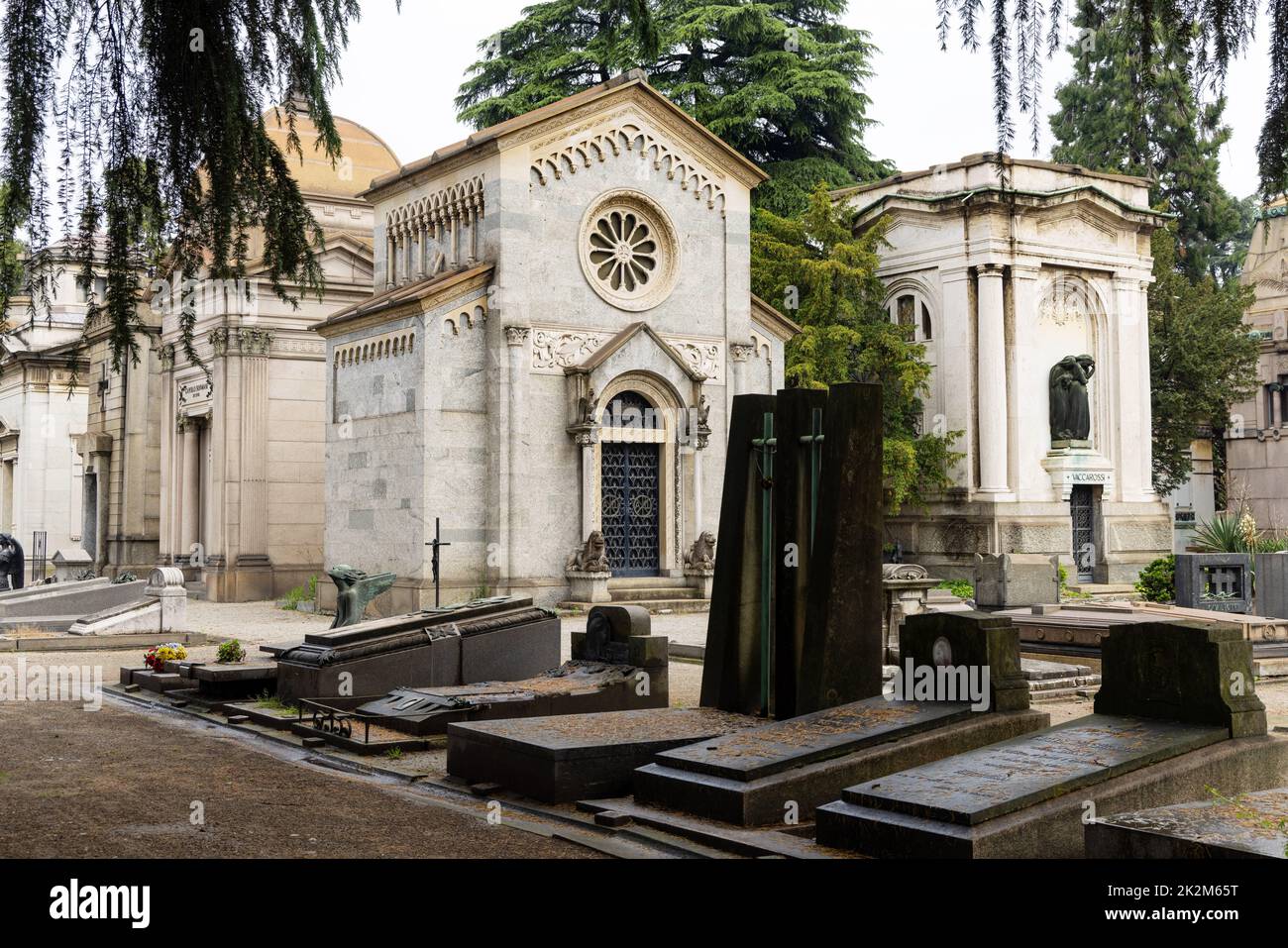 Monumental Cemetery of Milan (Cimitero Monumentale di Milano)  is one of the two largest cemeteries in Milan, Italy with many sculptures and artworks. Stock Photo