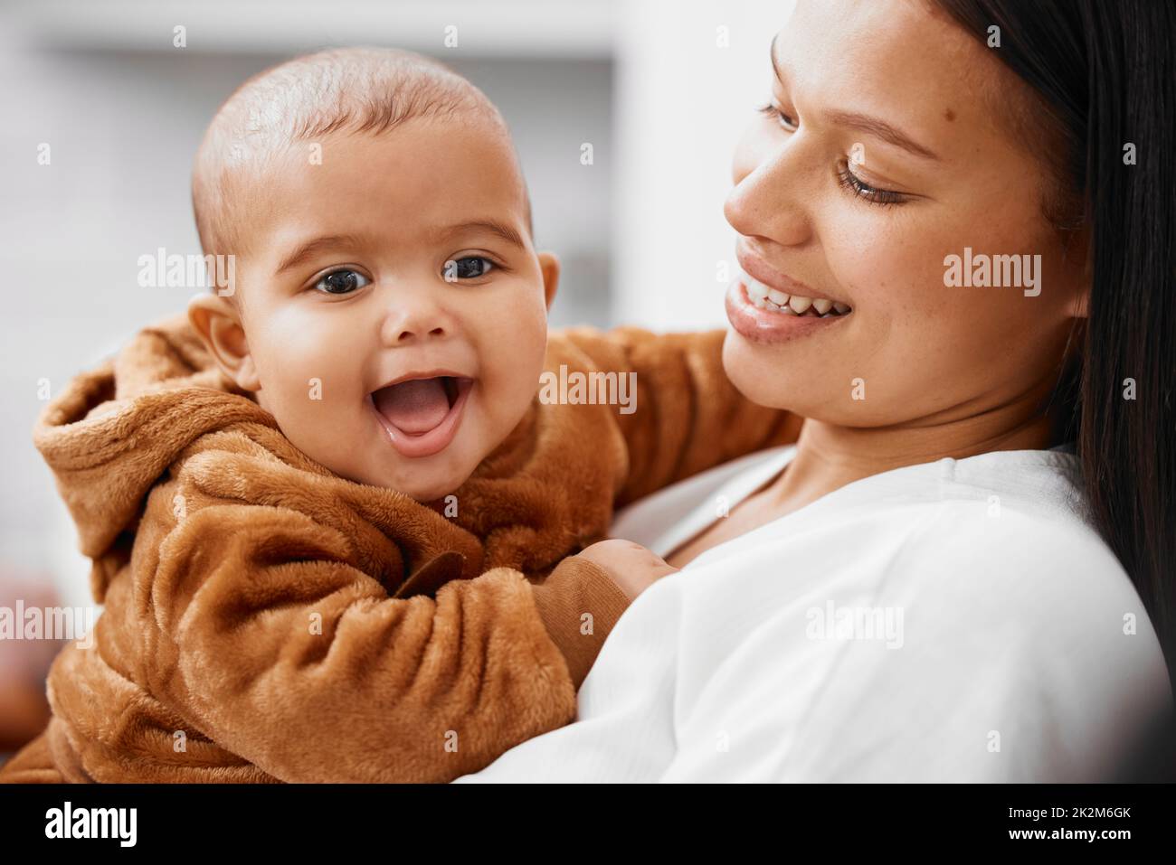Hes my happy boy. Shot of a young mother and her son relaxing at home. Stock Photo