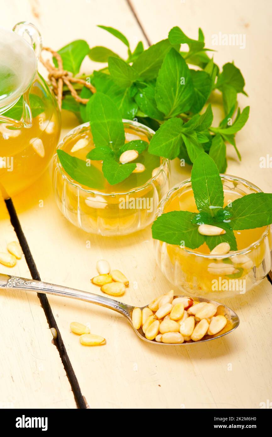 Arab traditional mint and pine nuts tea Stock Photo Alamy