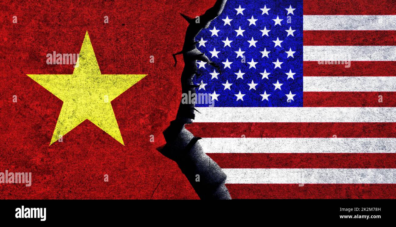 USA vs Vietnam flags on a wall with a crack. Vietnam and United States