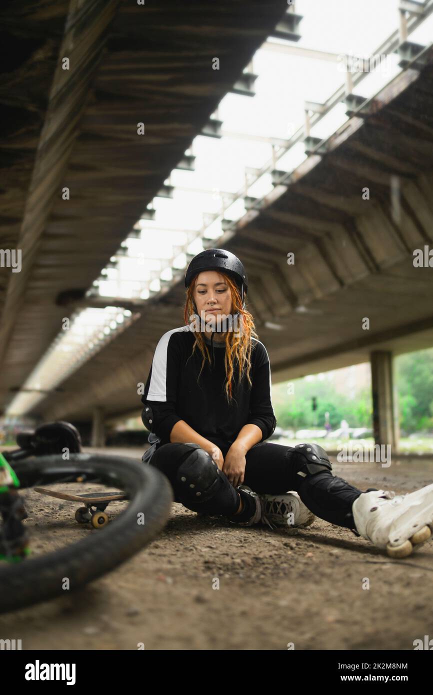 Young active woman wearing protection gear Stock Photo