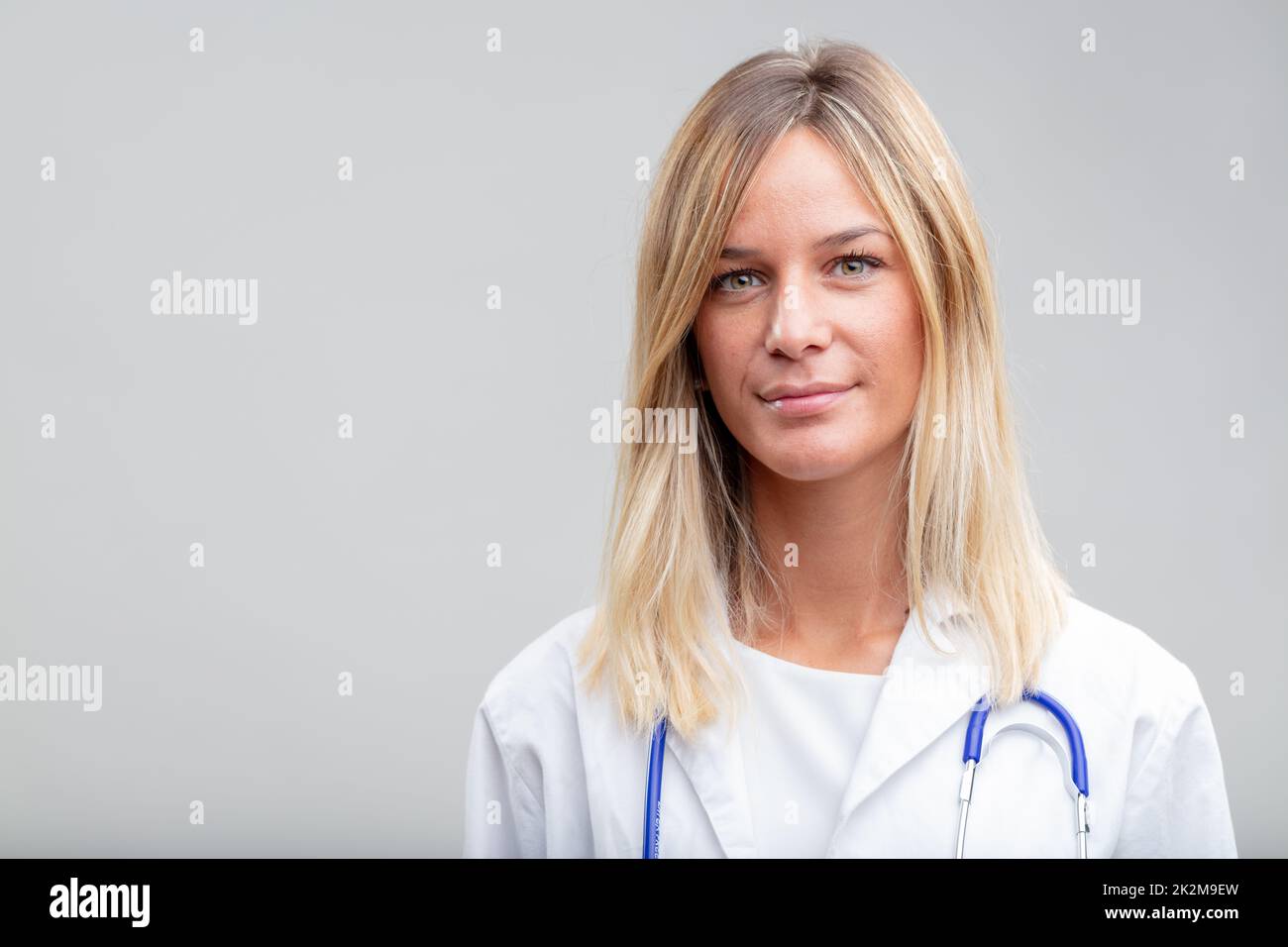 Attractive young female nurse or doctor Stock Photo