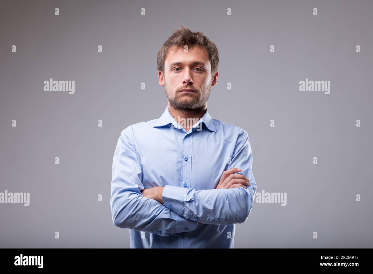 Unemotional man with a deadpan expression Stock Photo