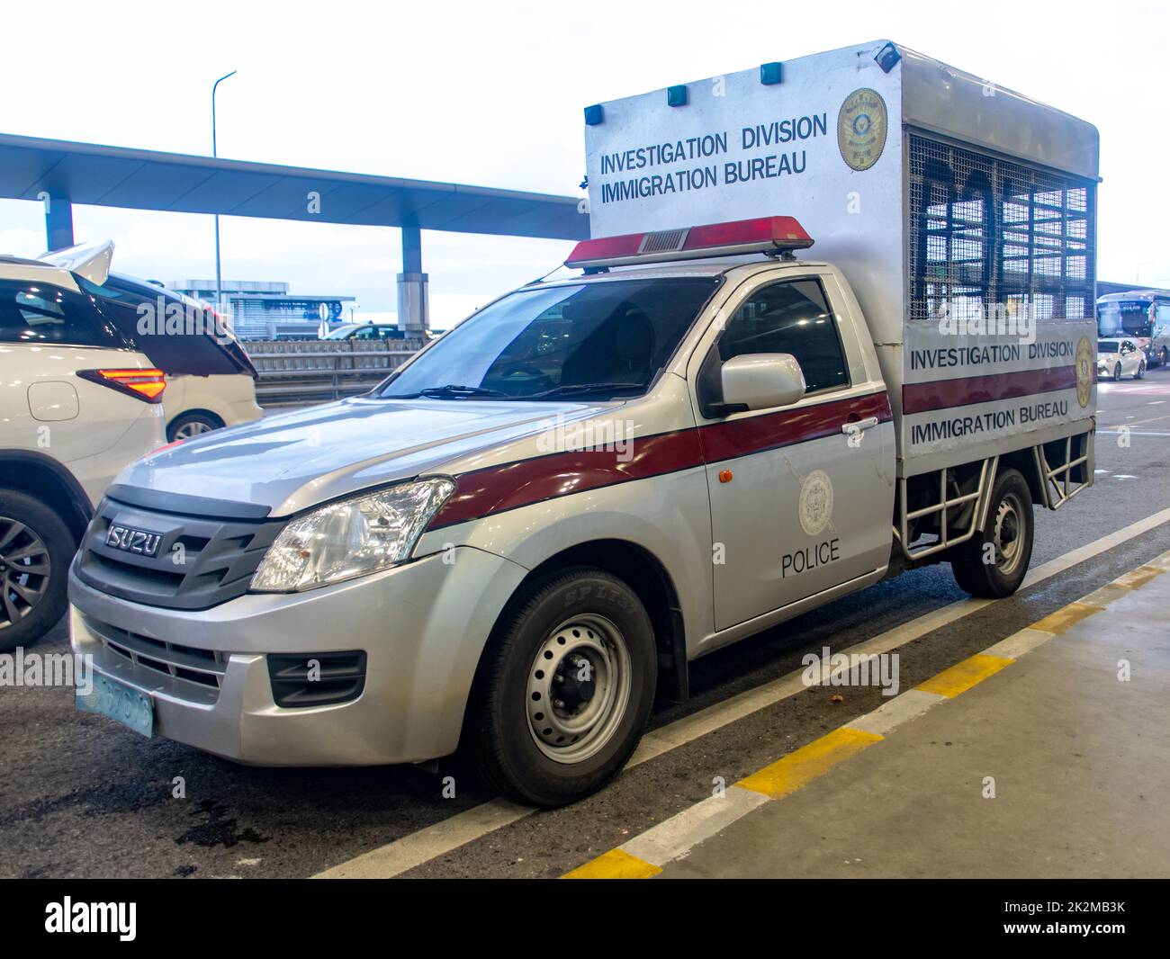 BANGKOK, THAILAND, SEP 15 2022, An immigration bureau car is parked outside the international airport Stock Photo