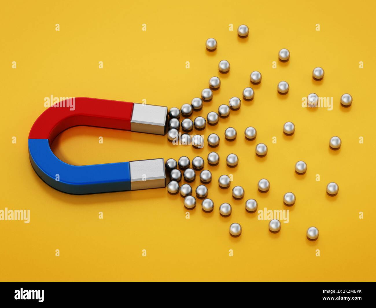 Horseshoe attracts groups of metal spheres. 3D illustration