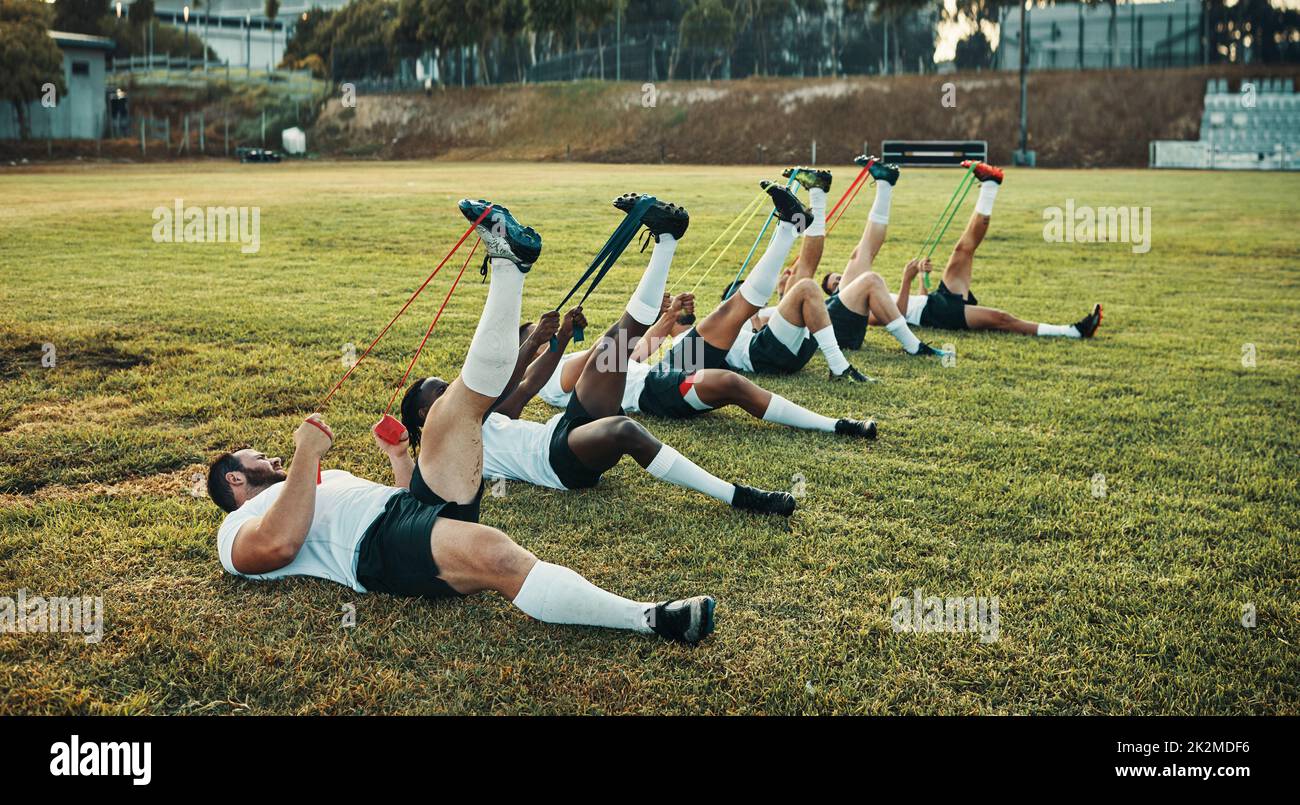 Rugby requires strong muscles. Full length shot of a group of young