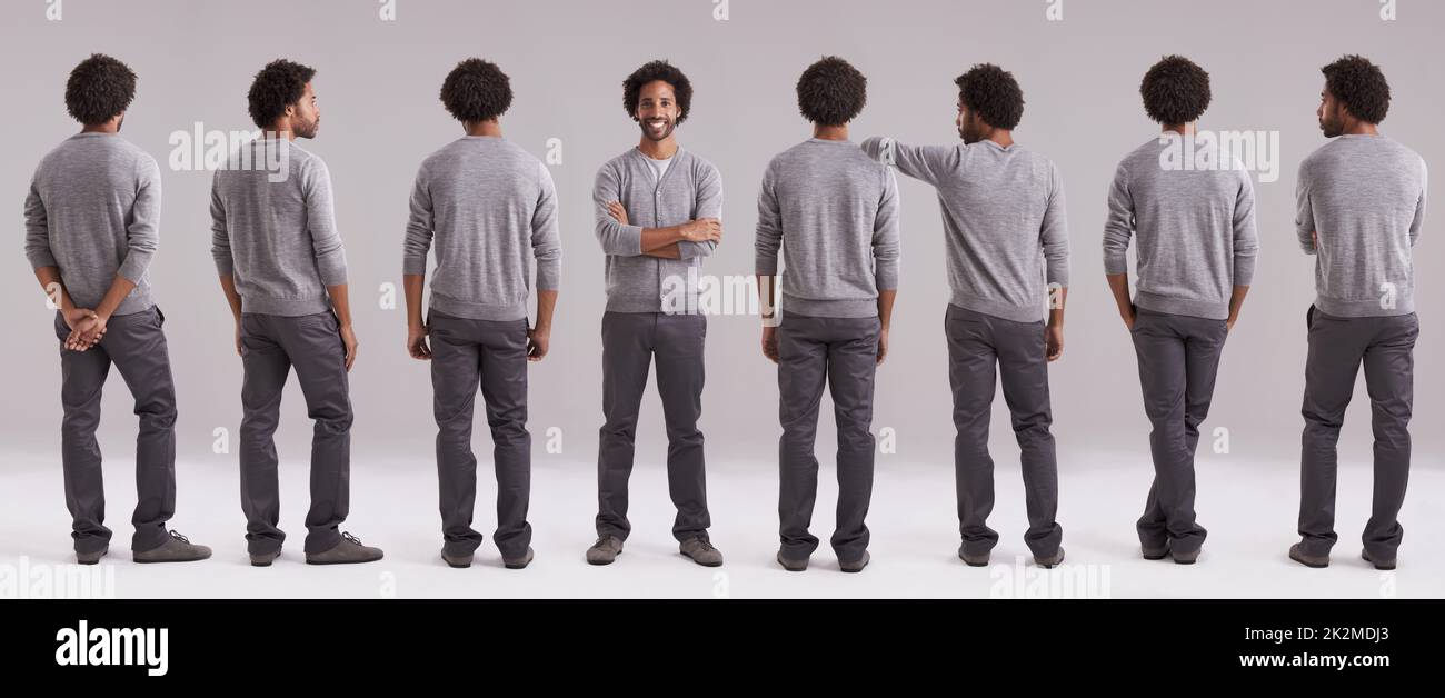 I choose to be happy today. Studio shot of a confident man standing out from a group of clones. Stock Photo