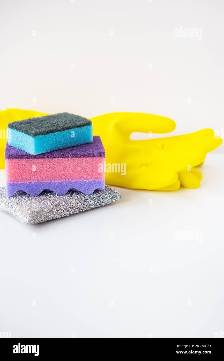 Preparation for cleaning the house, washcloths, rubber gloves, scraper. Cleanliness and cleaning concept. Stock Photo