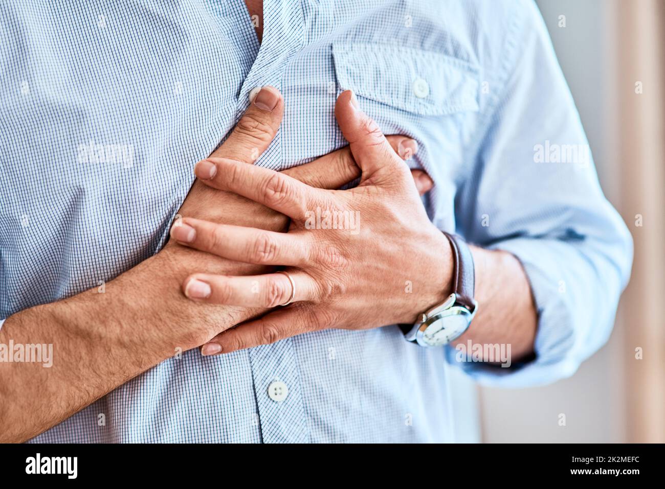 Chest pains are never a good sign. Shot of a unrecognizable man holding