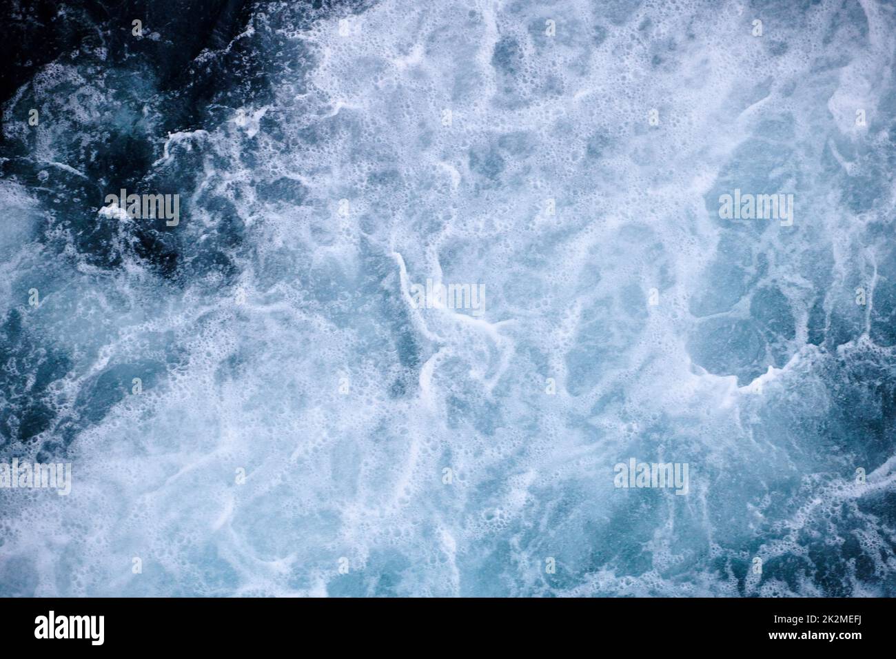 swirling water with air bubbles Stock Photo