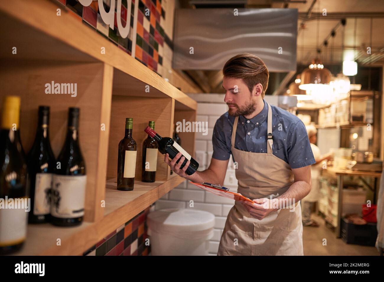 Looks like well need more of these. Shot of a young business owner counting his merchandise. Stock Photo