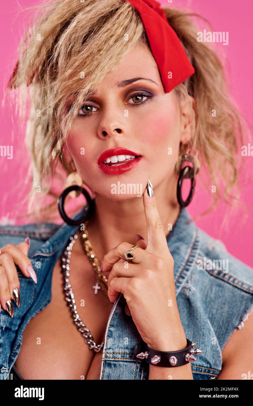 Everyone looked like a rockstar in the 80s. Studio shot of a beautiful
