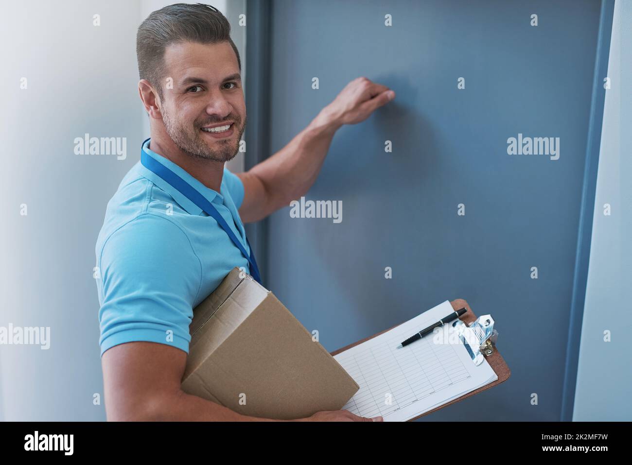 Person looking happy knocking on door hi-res stock photography and ...