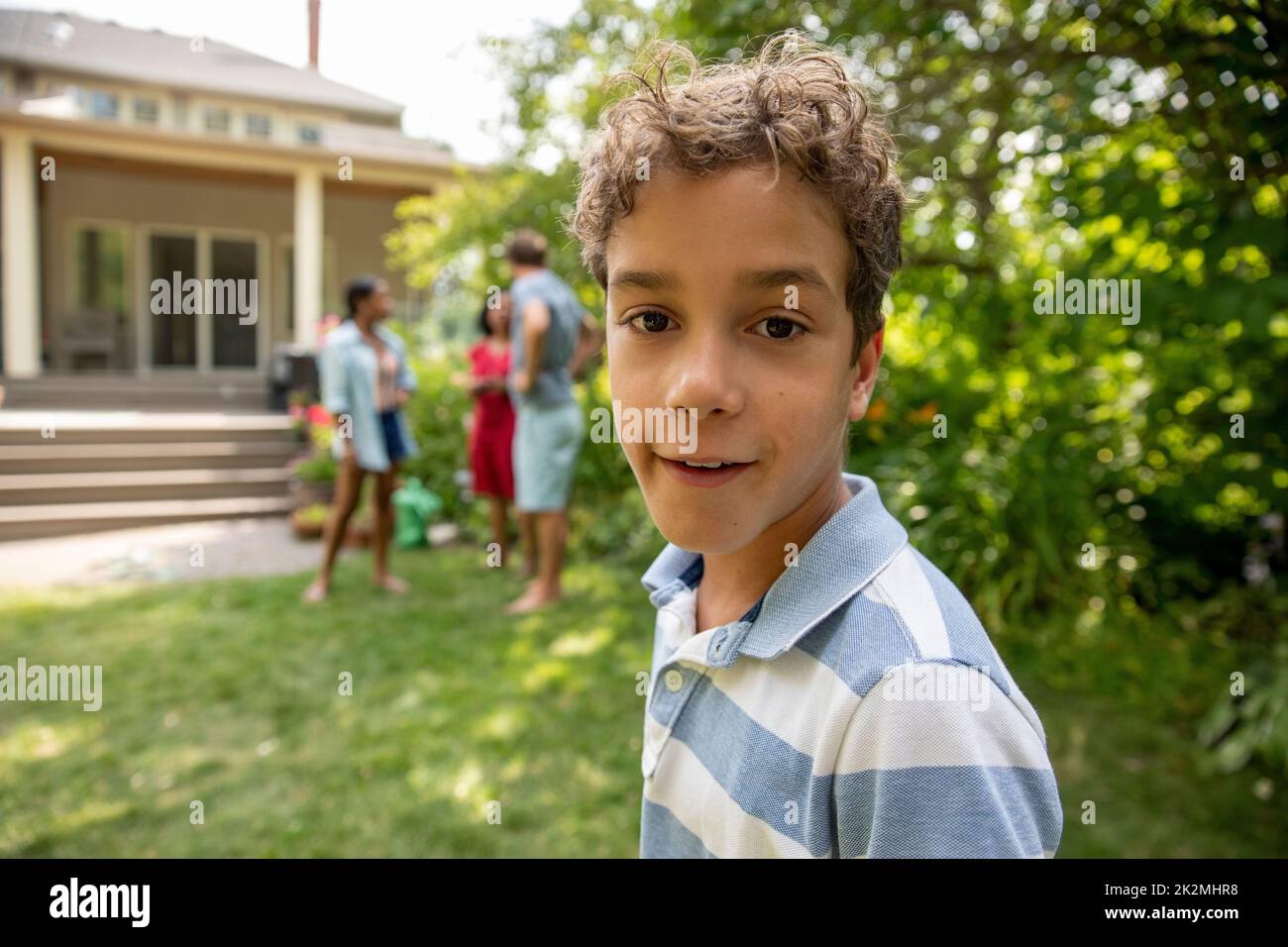 Boy in backyard hires stock photography and images Alamy