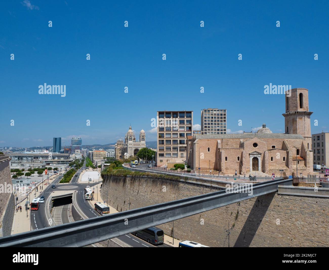 Marseille, France - May 15th 2022: Historic church St-Laurent surrounded by urban infrastructure Stock Photo