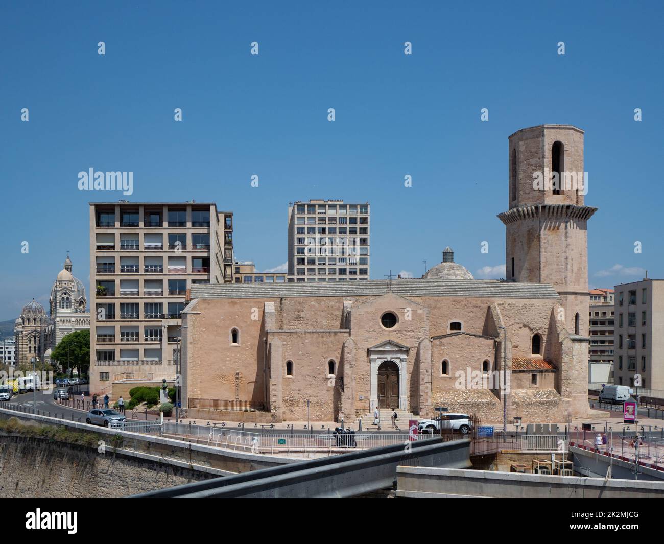 Marseille, France - May 15th 2022: Historic church St-Laurent surrounded by housing buildings Stock Photo