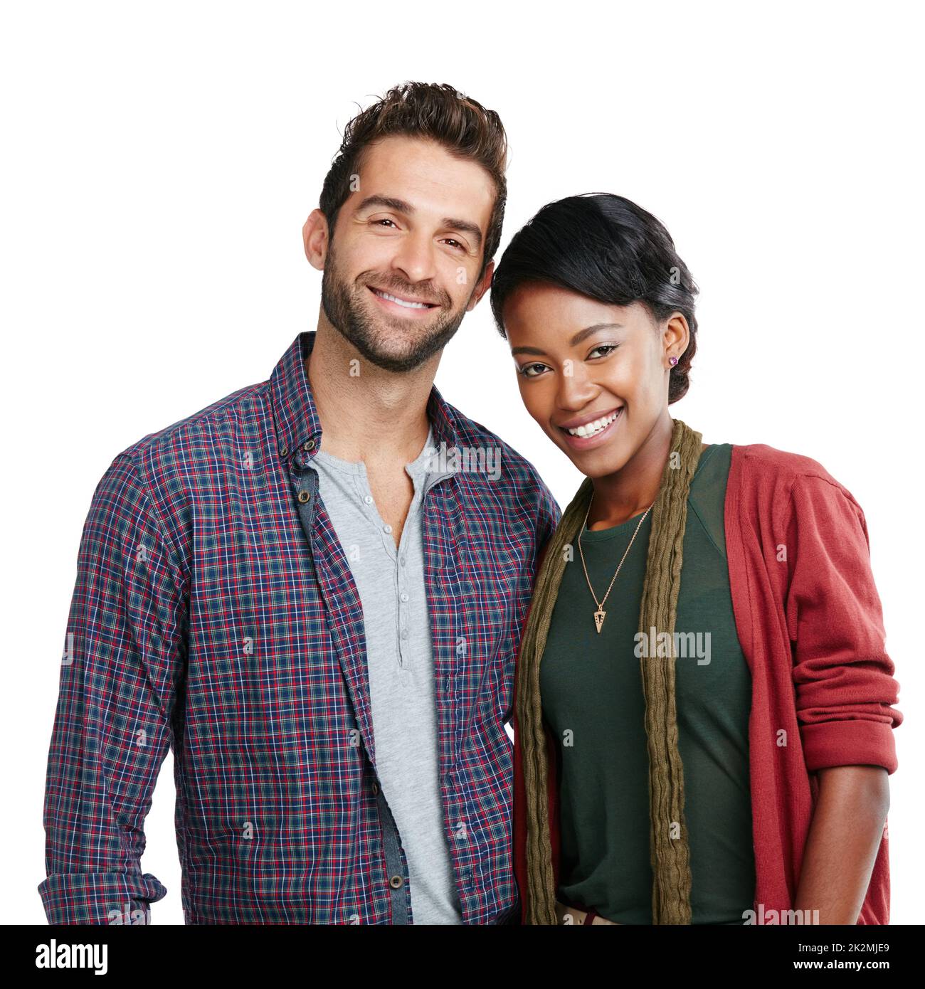 Together is the happiest place to be. Studio portrait of a happy couple standing together against a white background. Stock Photo