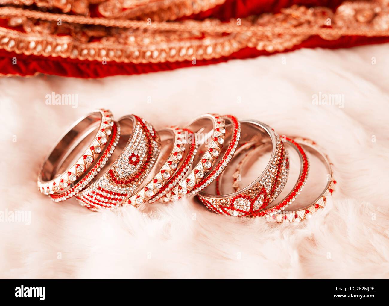 Glam up your look with these. Shot of beautiful bangles for a bride to wear at a traditional wedding. Stock Photo