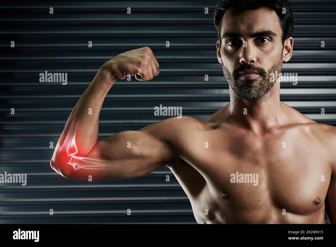 Muscular man looking bicep flexing hi-res stock photography and images -  Alamy