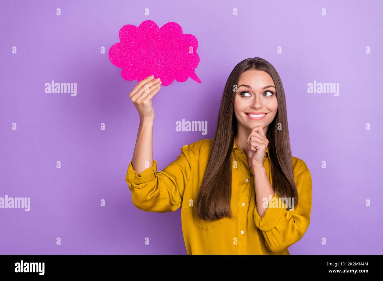 Photo of smart millennial lady hold look cloud wear yellow shirt isolated on purple color background Stock Photo