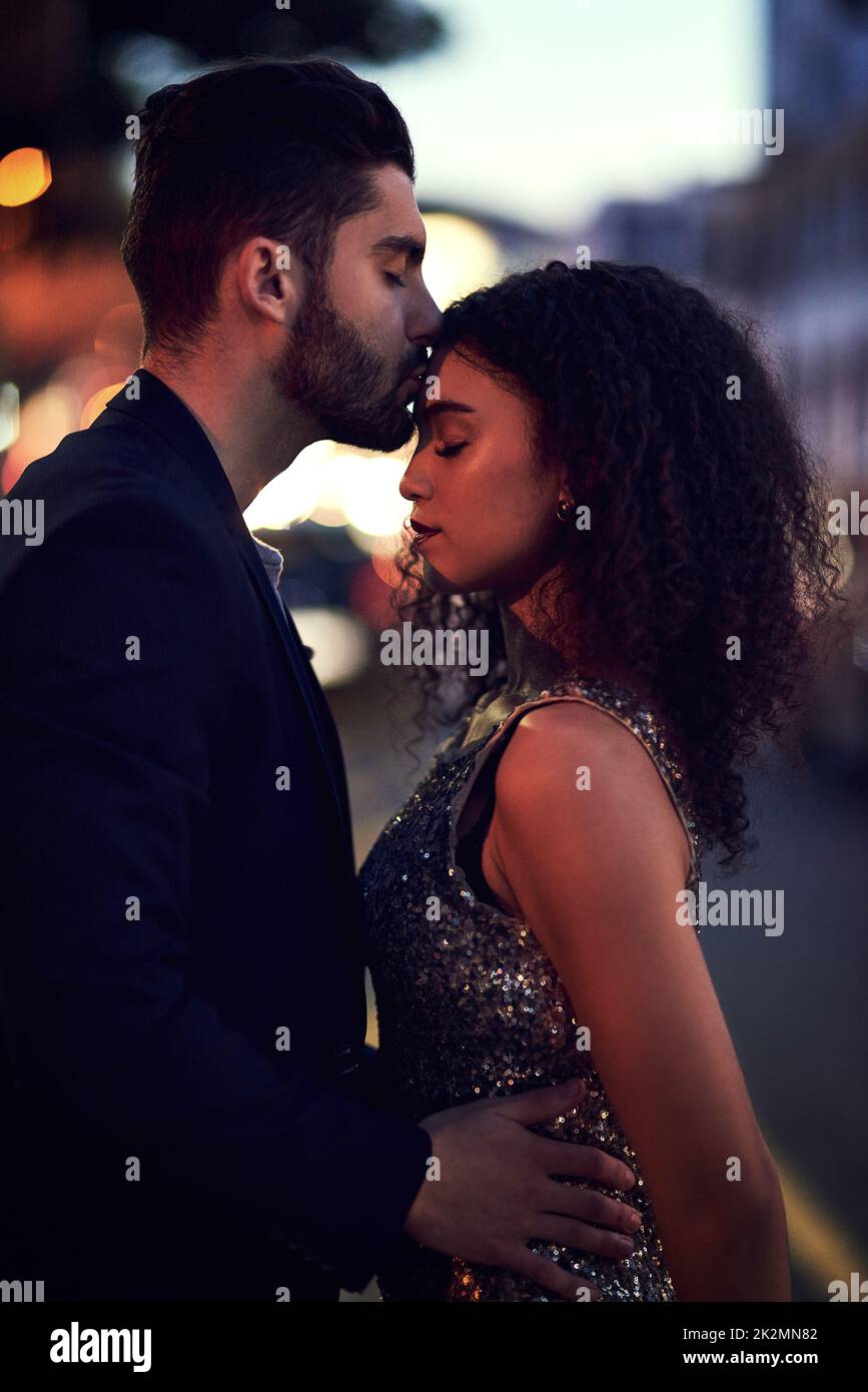 Special loving moments. Shot of a cheerful young couple holding one