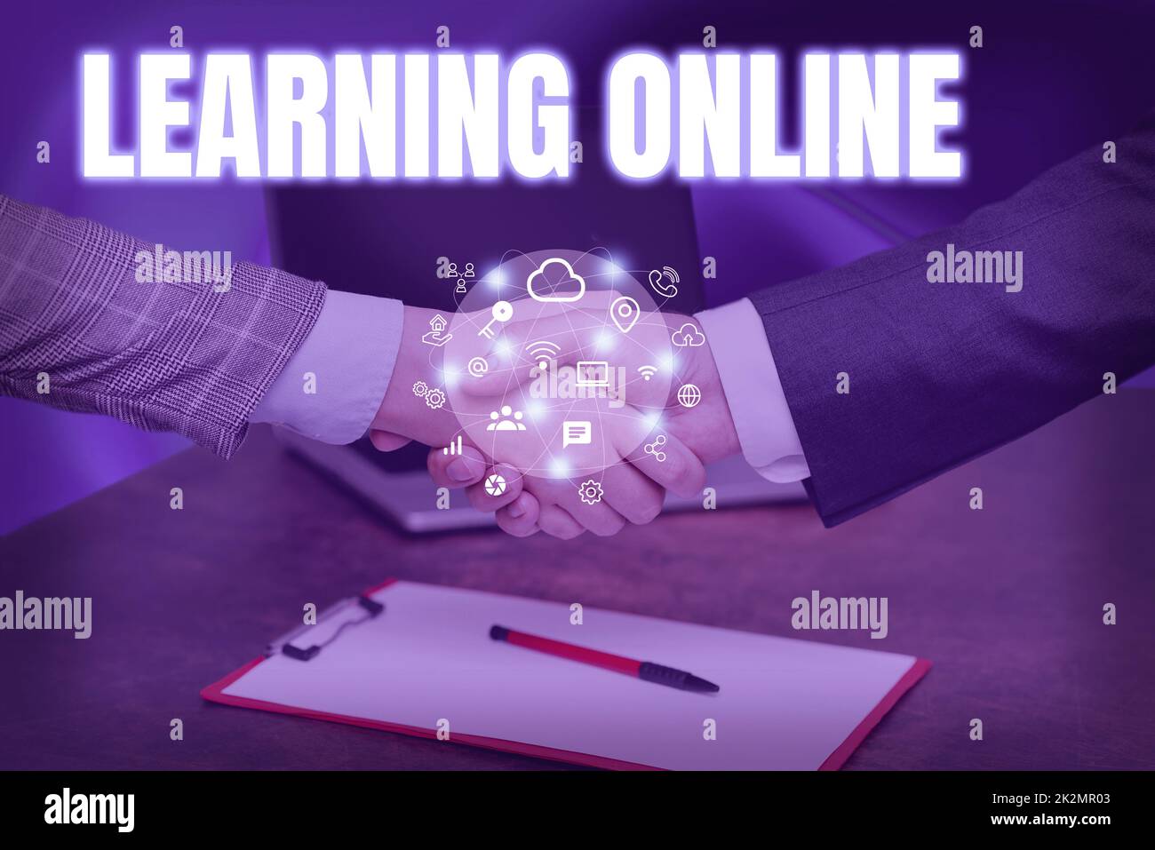 Handwriting text Learning Online. Business approach Learn something new with the help of internet and technology Hands Shaking Signing Contract Unlocking New Futuristic Technologies. Stock Photo